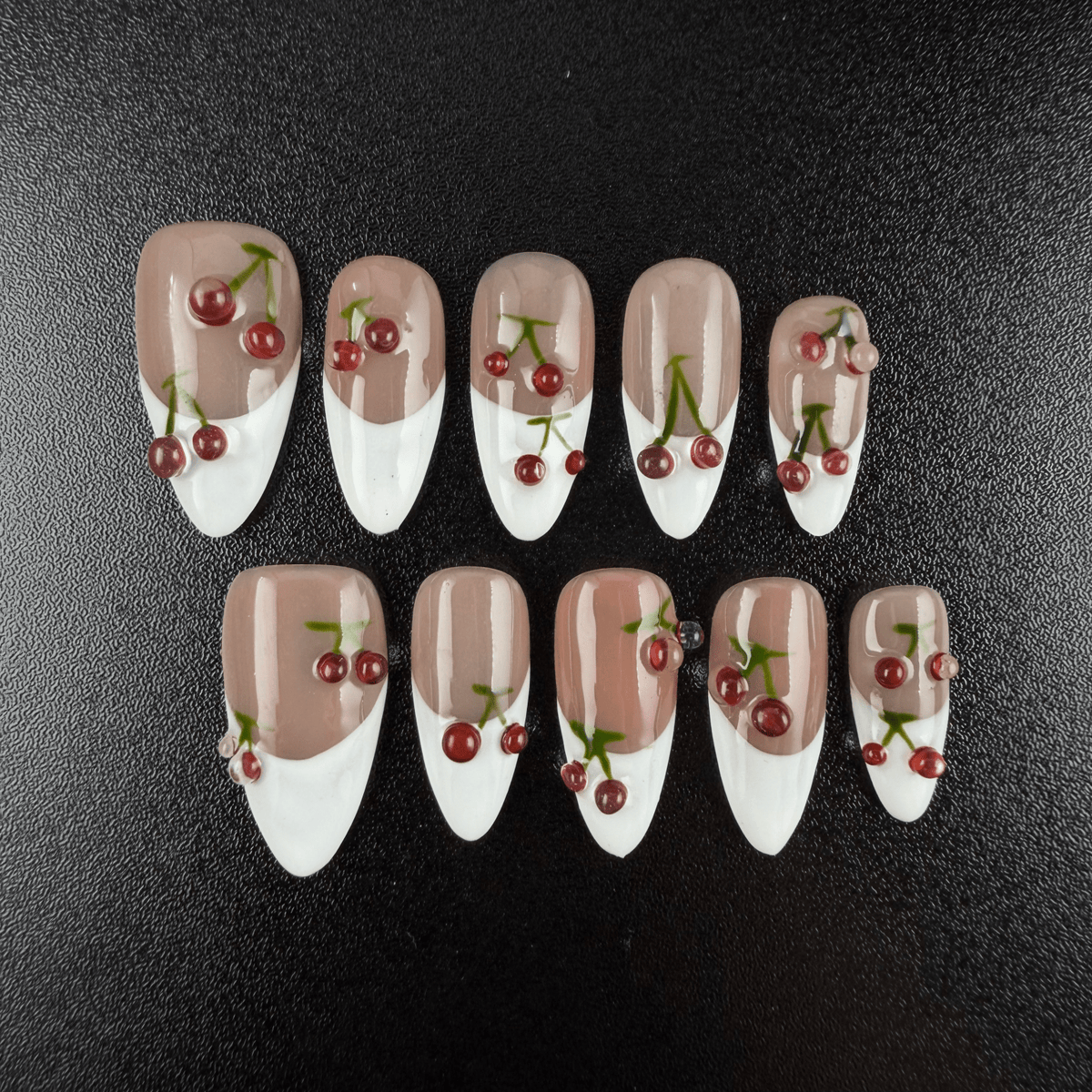 Almond French tip press on nails with 3D cherry decorations