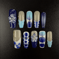 Blue and white porcelain floral press-on nails in long coffin shape