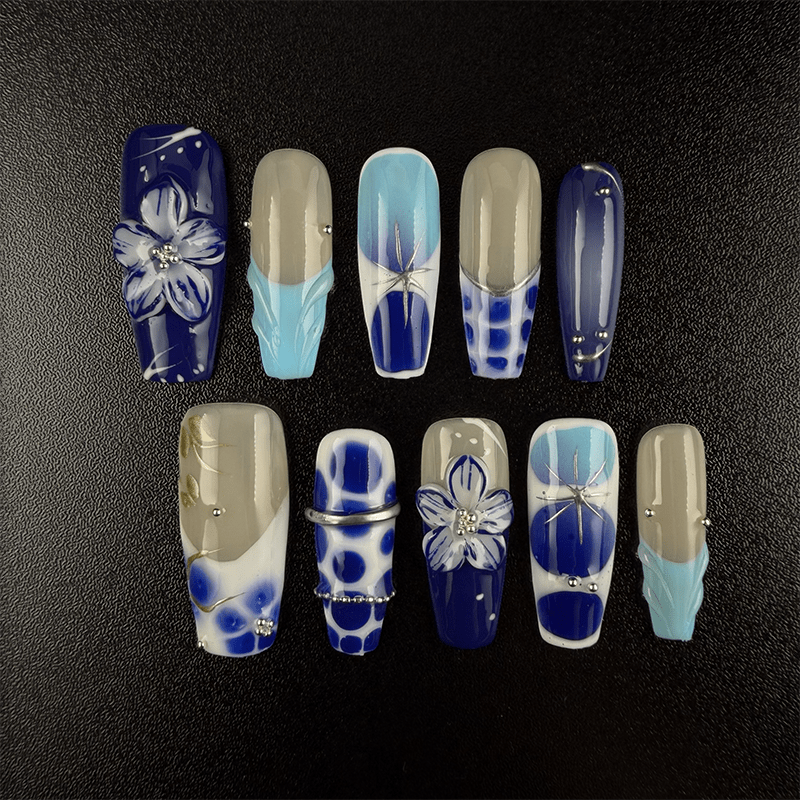 Blue and white porcelain floral press-on nails in long coffin shape