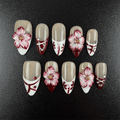Burgundy floral almond press on nails with white French tips and rhinestones