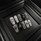 3D gothic press-on nails with red gems and chrome charms