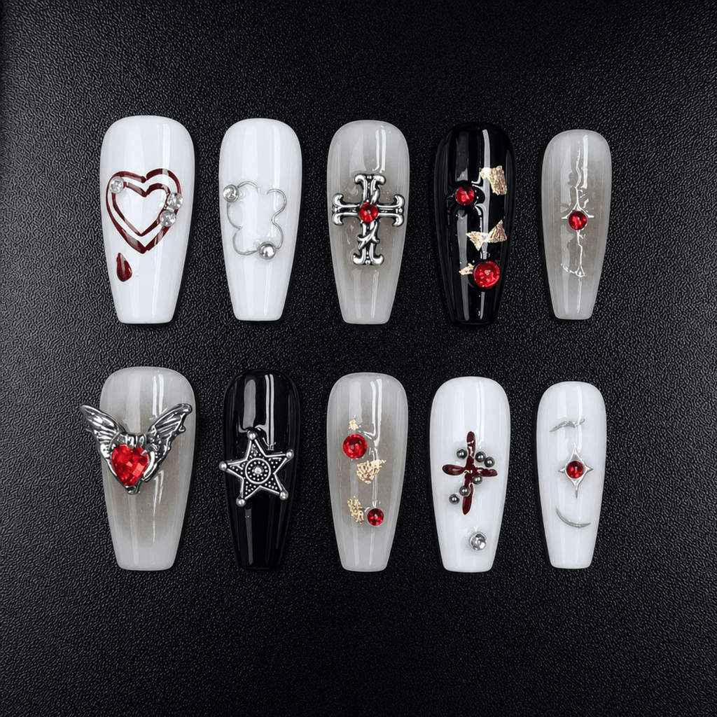 Gothic press-on nails in black, white, gray, and red