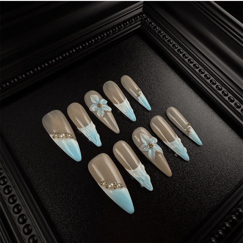 White pearls and gold beads on blue floral press on nails