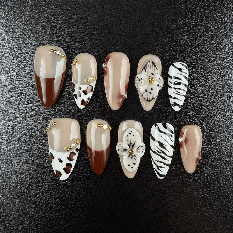 Milky white almond press on nails with blue pearl ocean-inspired details