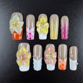Square french tip press on nails with green 3D flowers and pink orange tips